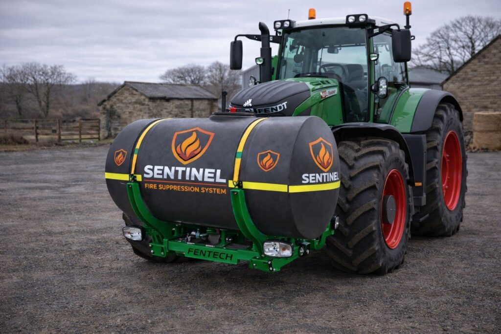 Sentinel fire suppression system mounted on the front of an agricultural tractor